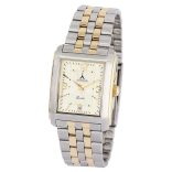 ASTRON 5029-9 férfi karóra, bicolor nemesacél tok, bicolor nemesacél csat, arab számos arany színű számlap, keményített ásványüveg, quartz szerkezet, cseppmentes vízállóság